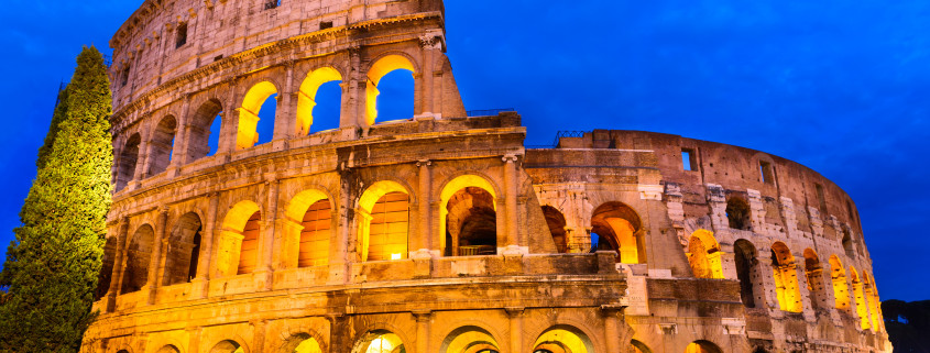 Colosseum, Rome, Italy. Twilight view of Coliseum known as Flavian Amphitheatre an elliptical amphitheatre largest in Roman Empire built in 80AD