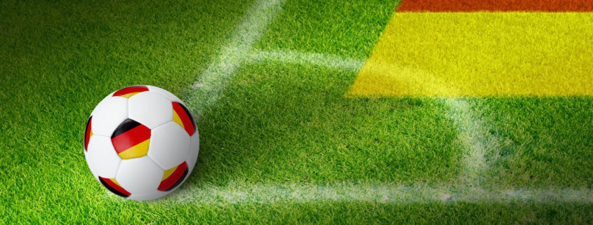 Sports background - soccer ball with Germany flag in field corner, germanl soccer, soccer stadium