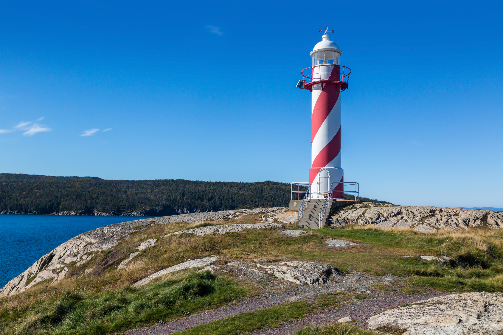 Candy cane colored lighthouse in Heart's Delight, Newfoundland, Canada.
