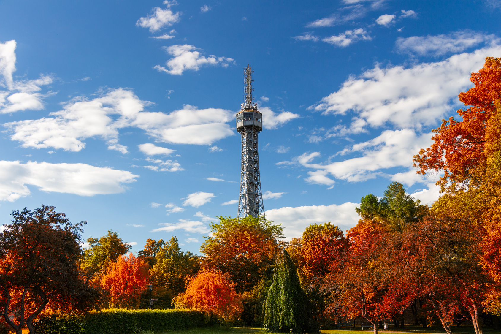 The Petrin observation and communication tower in Prague with red foliage, Czech Republic