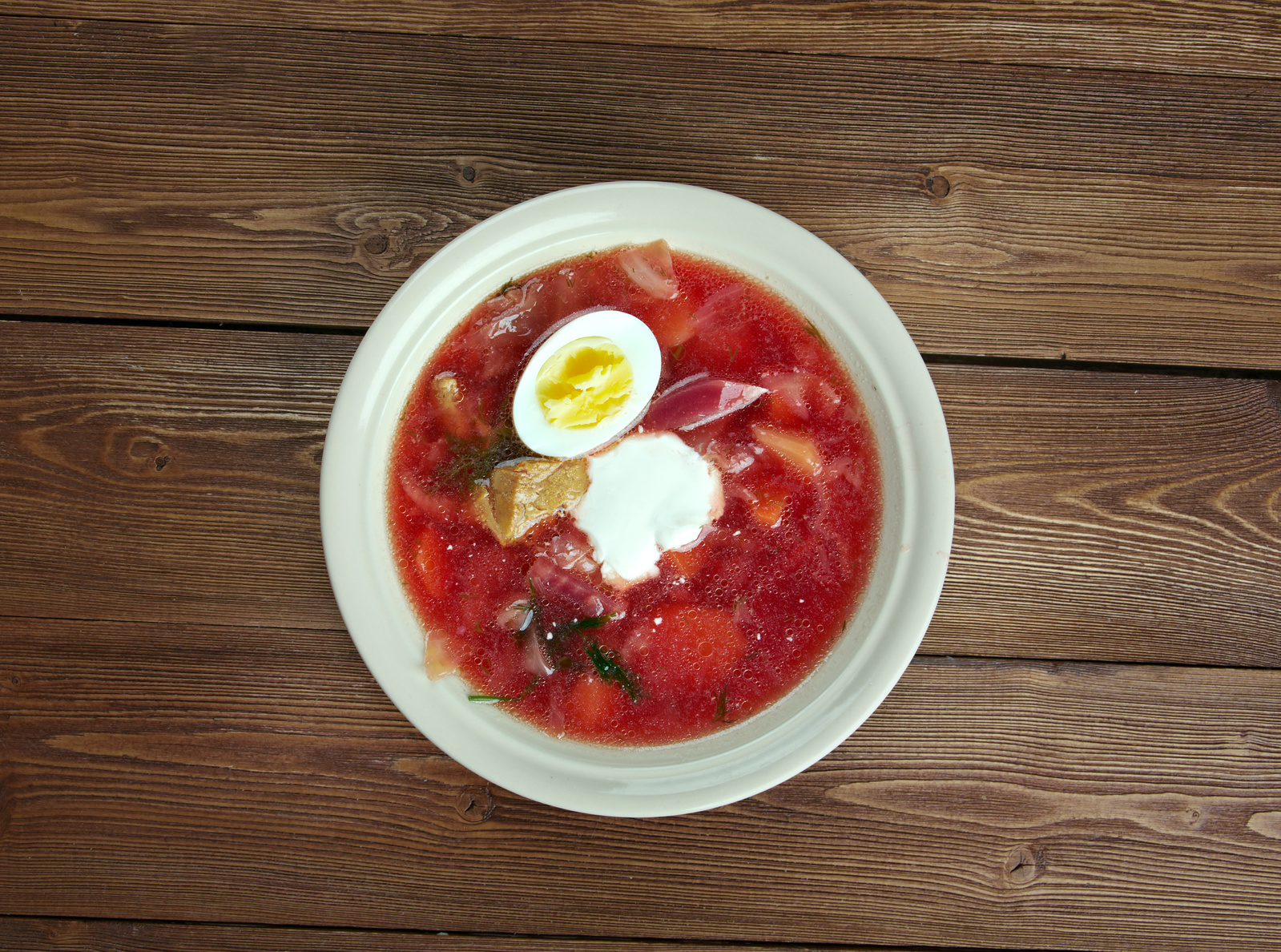 Polish barszcz -beetroot soup with egg ,popular in many Eastern and Central European cuisines.