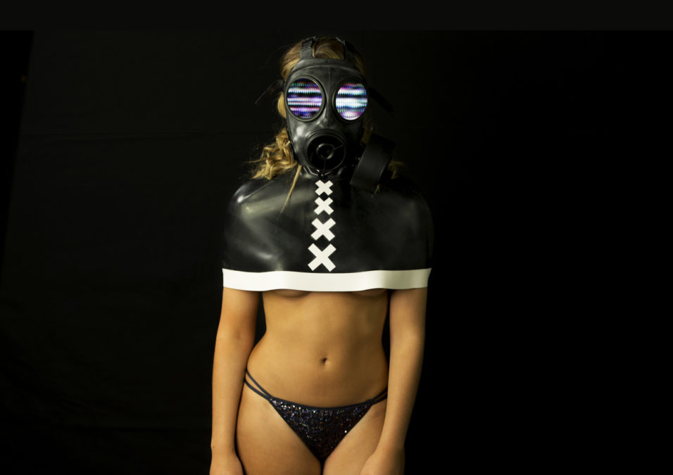 strange gas mask disco gogo dancer with latex top