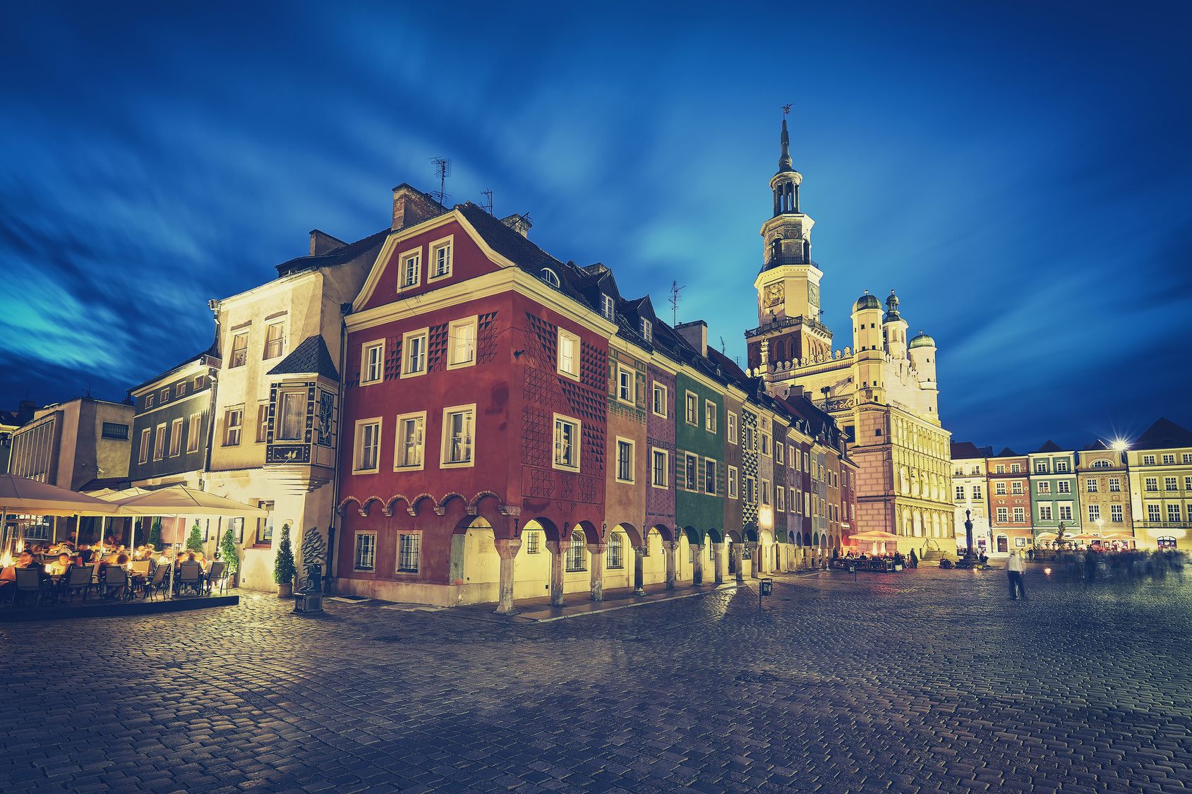 Retro stylized Old Market Square in Poznan at night, long exposure effect, Poland.