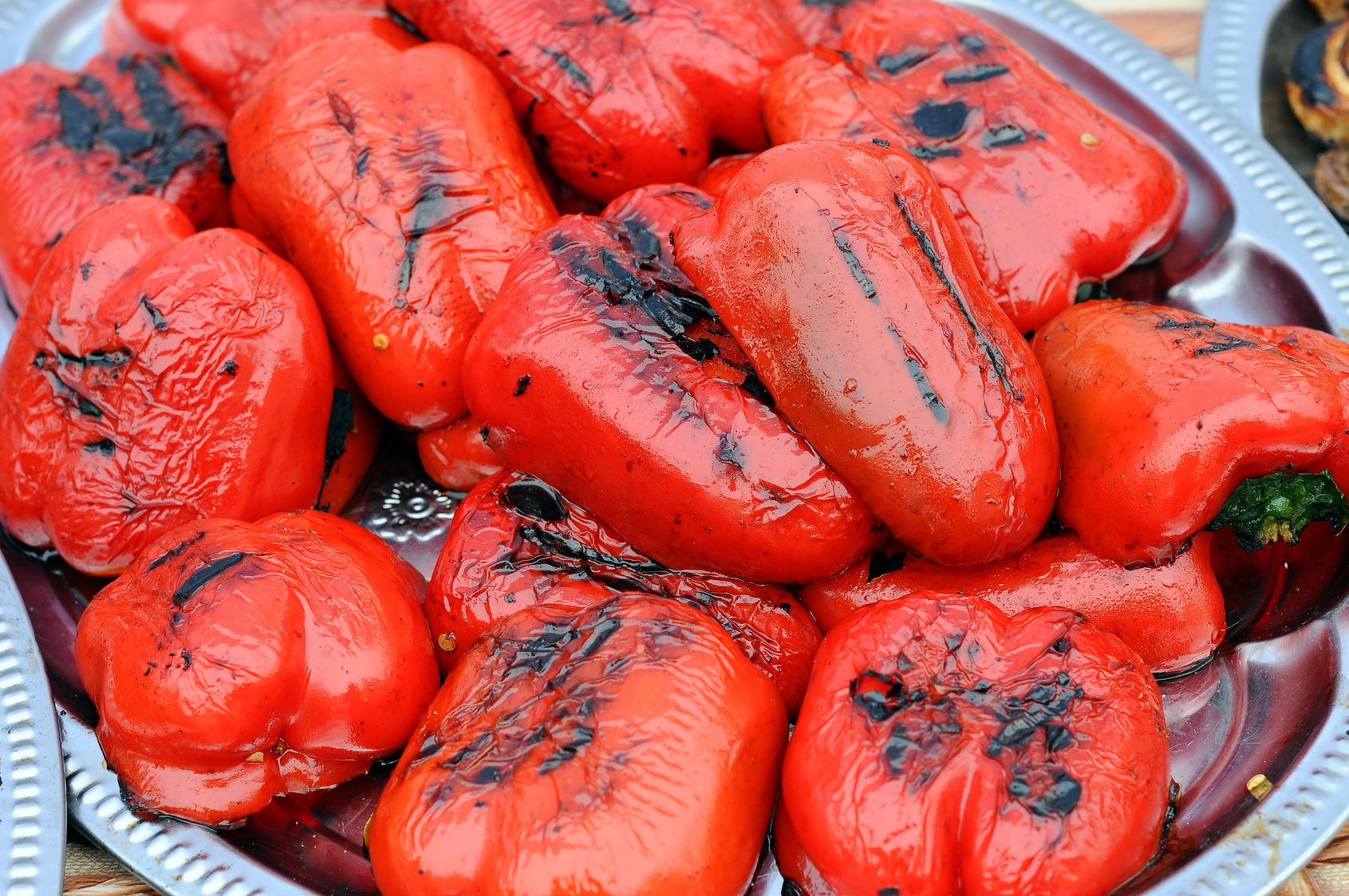 Red peppers on a grill. roasted red peppers.